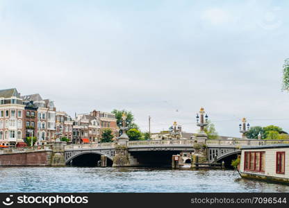 Amsterdam, Netherlands September 5, 2017: Magere Brug Bridge and Amstel river.