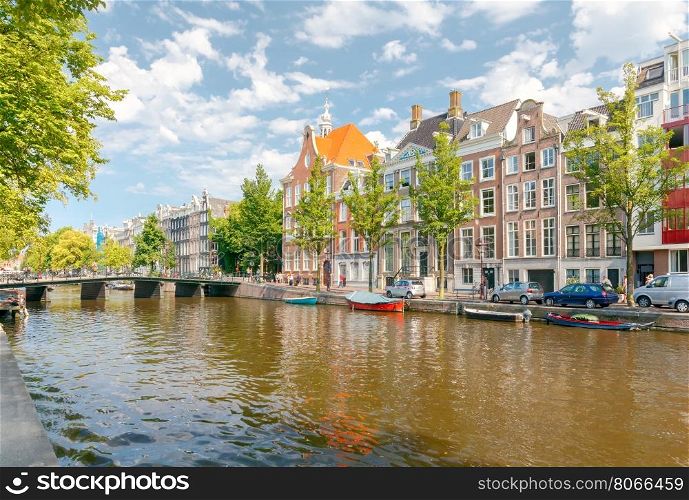 Amsterdam. Old city canal.. Traditional dutch houses on the canal. Amsterdam. Netherlands