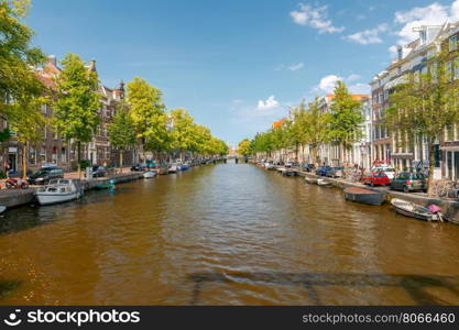 Amsterdam. Old city canal.. Traditional dutch houses on the canal. Amsterdam. Netherlands