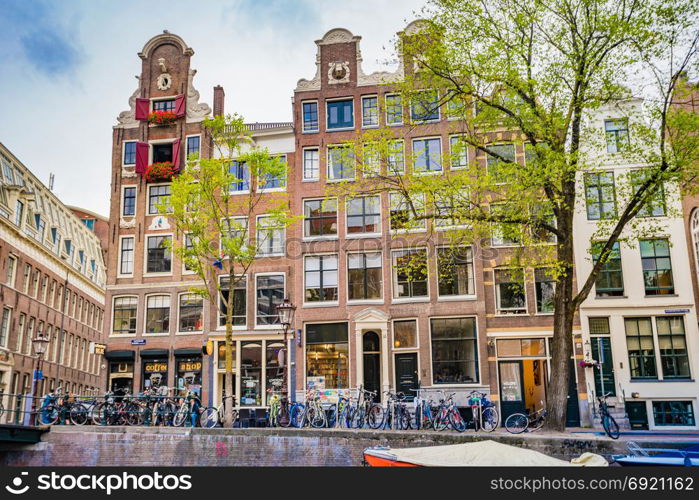 Amsterdam, the Netherlands, September 5, 2017 : Canal in Amsterdam in a beautiful summer day