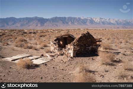 An abandoned dwelling on the desert valley floor