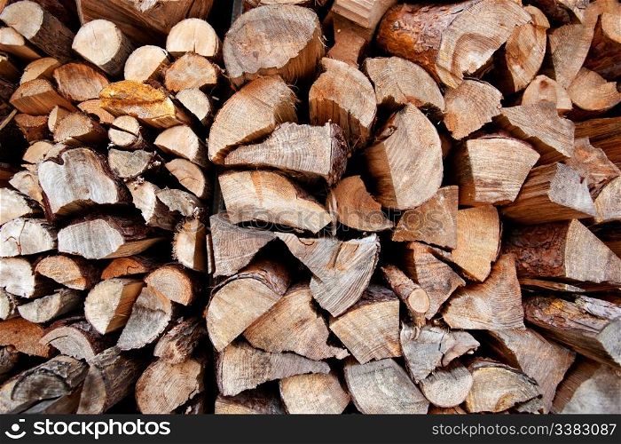 An abstract background of firewood stacked