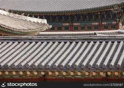 An abstract view that stacks the roof tiles from four different buildings at the Gyeongbokgung Palace complex in Seoul, South Korea.
