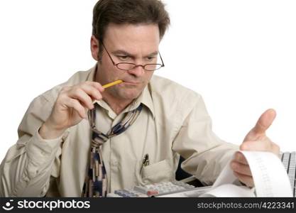 An accountant concentrating on his calculations. Isolated on white.