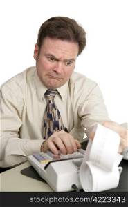 An accountant going over figures and very upset by the result. Isolated on white.