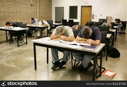 An adult education class sound asleep on their desks.