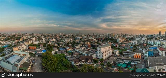 An aerial view of Bangkok city with evening sunshine
