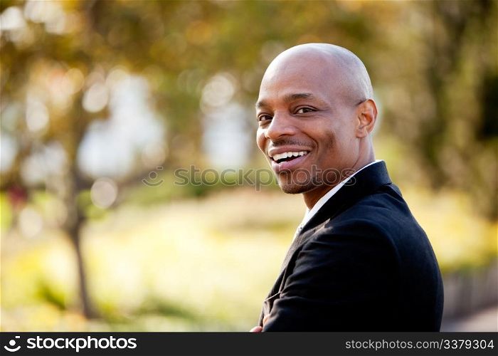An African American business man with a big smile