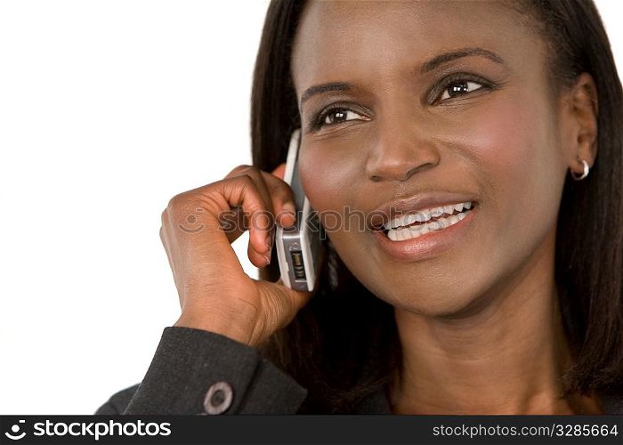 An African American businesswoman chatting on her mobile phone