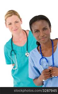 An African American female doctor with her colleague out of focus behind her