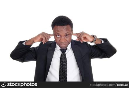 An African American man in a suit in close up putting his fingers in hisears, dona??t like to hear, isolated for white background