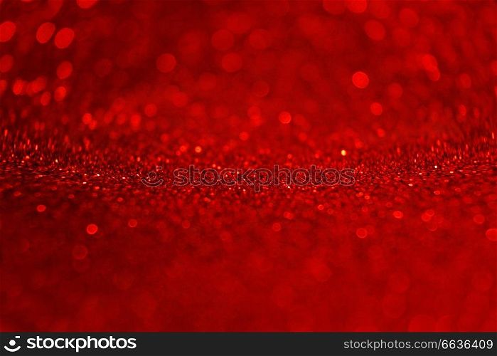 An amazing and beautiful macro of a red glow purpurin surface with glitters and depth of field