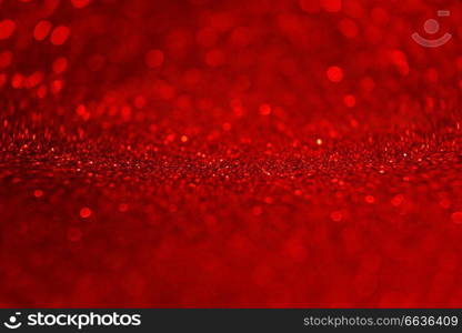 An amazing and beautiful macro of a red glow purpurin surface with glitters and depth of field