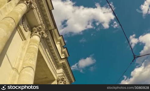 An amazing timelapse of a great example of classical 19th century architecture with moving clouds on the background