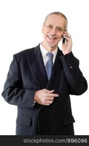 An amiable businessman smiling on mobile phone