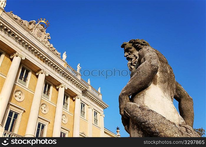An ancient statue in front of a italian neoclassic villa, Como, Italy