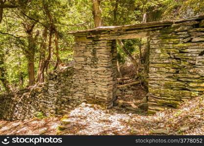 An ancient stone doorway in the woods near Nonza on Cap Corse in Corsica