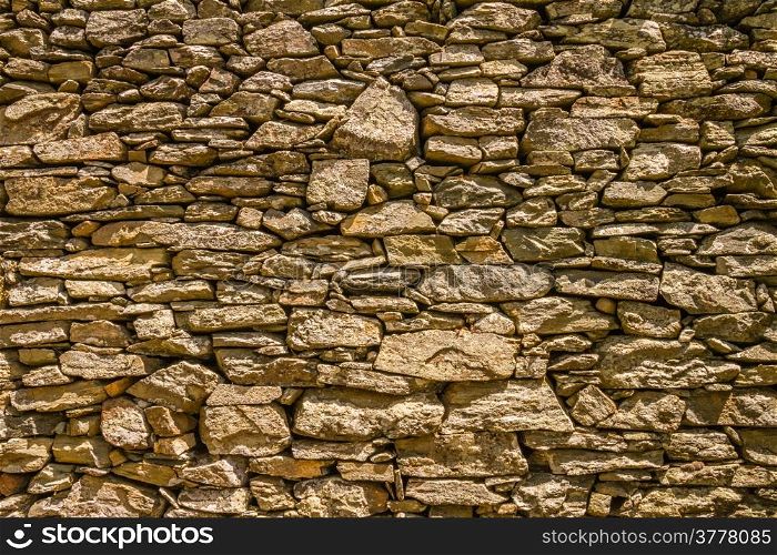 An ancient stone wall used for terracing near Nonza on Cap Corse in Corsica