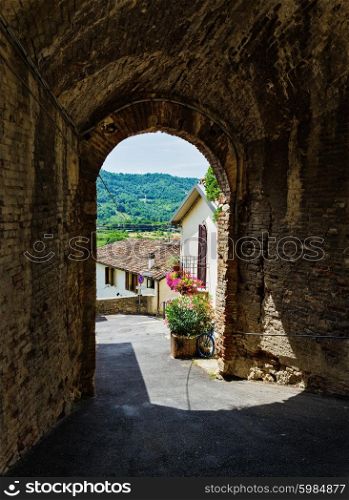 An arched passageway in the old Italian city
