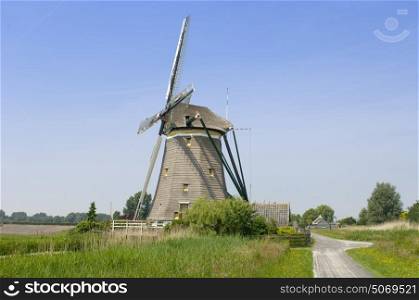 An archetypal Dutch windmill in Leidschendam on a nice spring day.