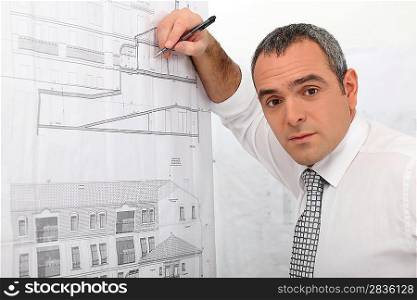 An architect drawing a plan