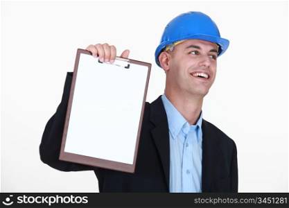 An architect presenting a clipboard.