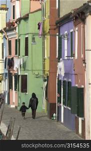 An array of colorful residential buildings in Venice, Burano, Italy