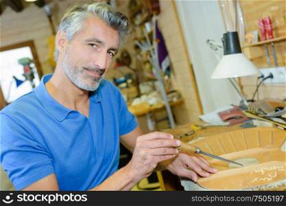 an artisan in the workshop