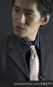 An asian fashion model in smart casual clothing