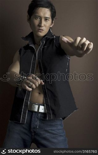 An asian male model in a kung-fu pose