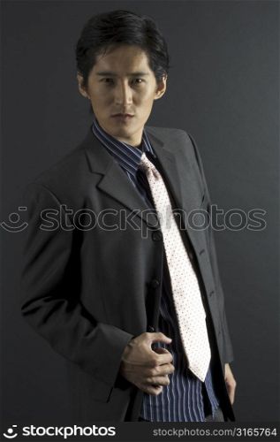 An asian model in smart casual clothing