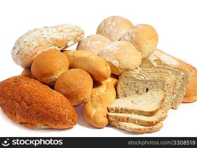 An assortment of different loaves of bread and bread rolls, over a white background.