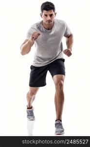 An athletic man running, isolated over a white background