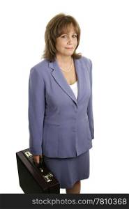 An attractive, competent looking business woman in a blue suit with a briefcase.