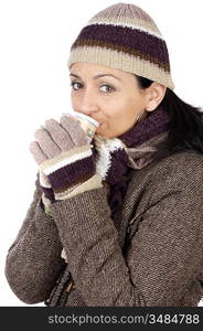 An attractive lady sheltered for the winter drinking a tea cup