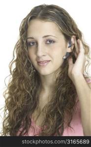 An attractive model wearing a bluetooth headset