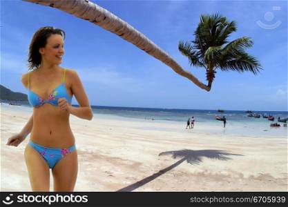 An attractive woman on a beautiful Beach.