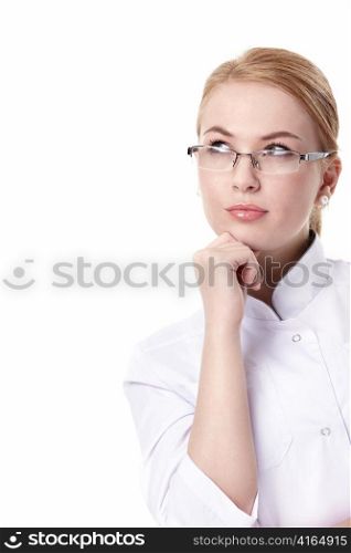 An attractive young doctor in glasses on white background