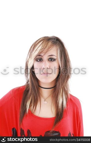 An attractive young female with a serious expression is wearing a punk hairstyle with blond hair. Vertical shot.