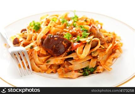 An aubergine (eggplant) and tomato sauce served tossed with fettuccelle pasta and garnished with fresh parsley