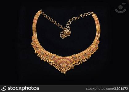 an authentic indian jewellery isolated on black background