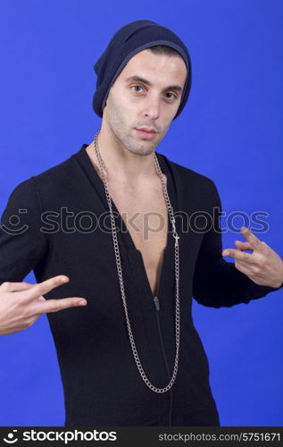 an casual young man portrait over a blue background