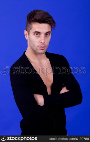 an casual young man portrait over a blue background