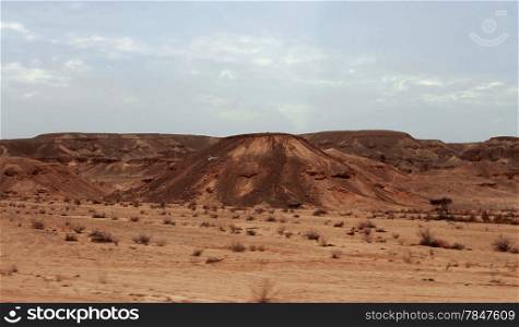 An Egyptian Desert And Mysty Sky in the daylight