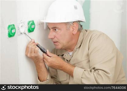 an electrician man at work