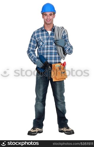 An electrician with a drill.