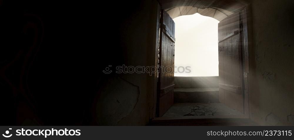 An empty dark basement in the rays of bright light. Concept, background with clipping path