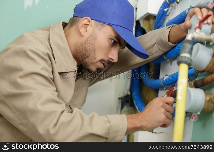 an engineer controlling a quality of water
