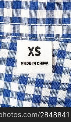 An extra small label on a shirt