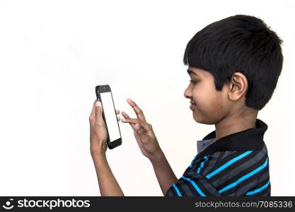 an handsome kid addicted to his cell phone